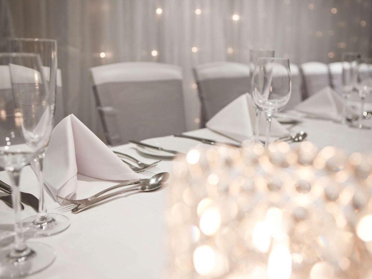 Hotel Pullman Sydney Hyde Park Esterno foto A table set for a formal dinner