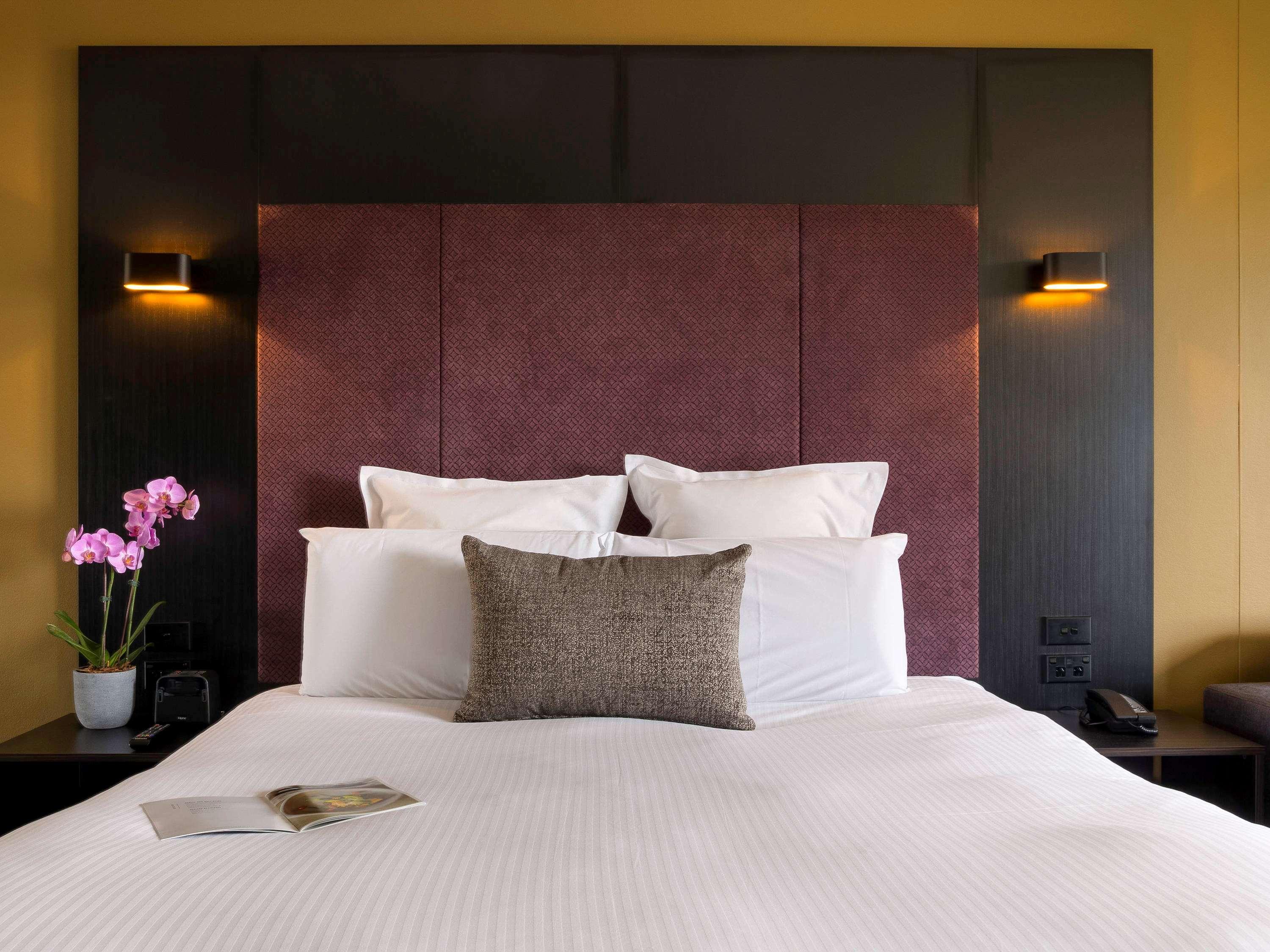 Hotel Pullman Sydney Hyde Park Esterno foto A bedroom at the hotel